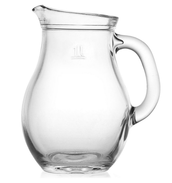 An empty, clear glass carafe with a handle and a spout stands on a white background. A small '1.0' marking is visible on the upper part of the body.